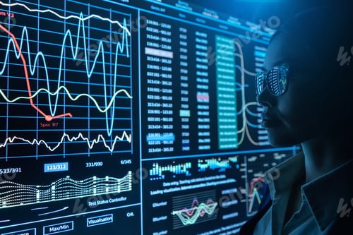 Preview: The businesswoman works with infographic on a black monitor.