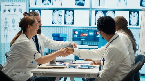 Preview: Medical experts analyze radiography scans in a meeting with the staff