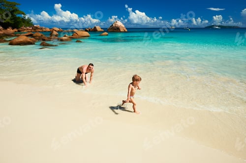 Preview: Two Year Old Baby Boy And His Father Playing On Beach At Seychelles