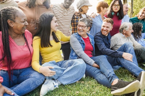 Preview: Group of multigenerational people smiling and laughing together