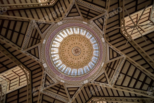 Preview: the ceiling in the building is ornately decorated and has a circular window above it