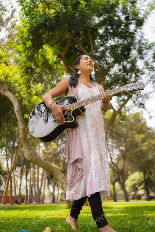 Preview: Woman practicing a musical performance in the park