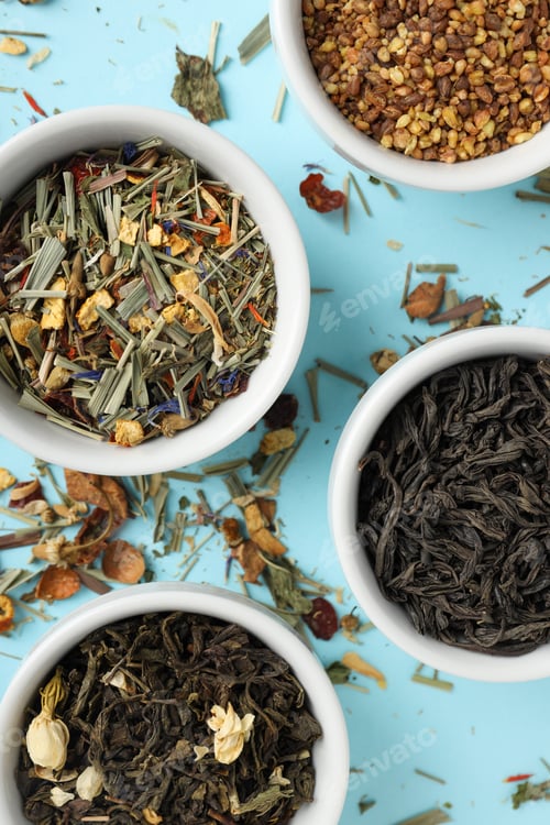Preview: Concept of cooking tea with different types of tea on blue background