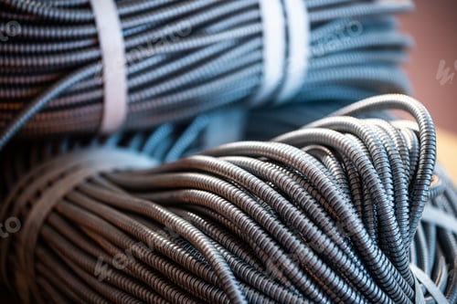 Preview: Close-up of a huge bundle of metal flexible tubes