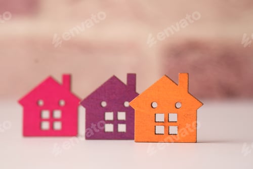 Preview: colorful wooden houses on white , the concept of finance concept