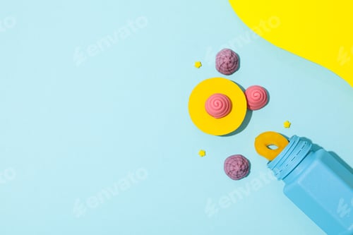 Preview: Jelly candies in blue jar on blue background, space for text