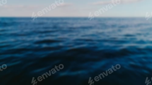Preview: Blurred shot of sea and sky at background