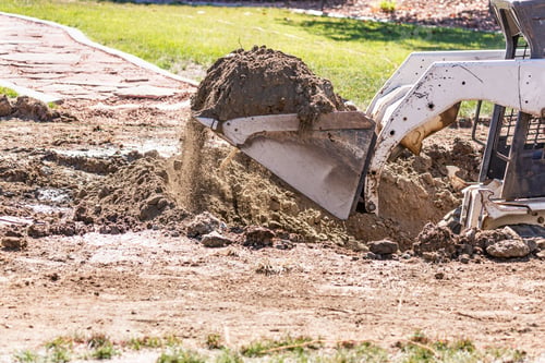 Preview: Small Bulldozer Digging In Yard For Pool Installation