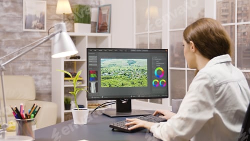 Preview: Female content creator working on post production of a movie