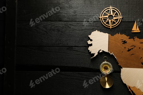 Preview: Columbus Day. Vintage compass with wooden model of America