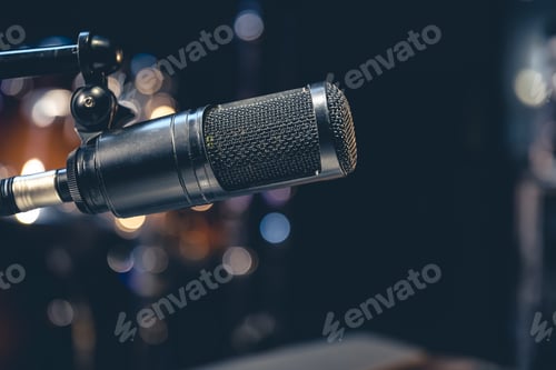 Preview: Professional microphone on a blurred background with bokeh.