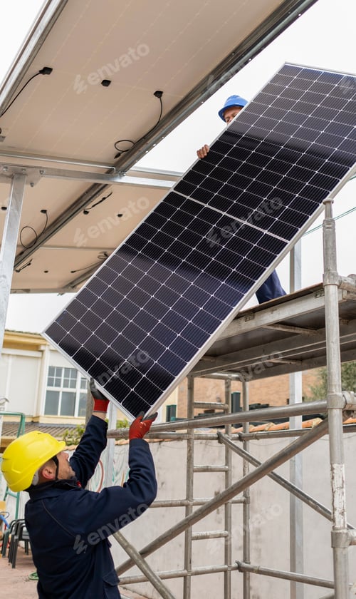 Preview: Workers installing solar panel on metal structure
