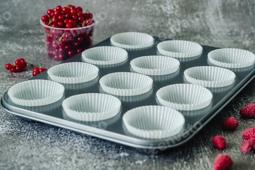 Preview: Muffin Tray with Liners and Fresh Red Berries