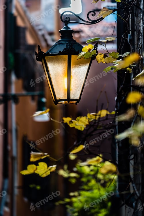 Preview: A street lamp at a narrow lane in Venice, Italy.