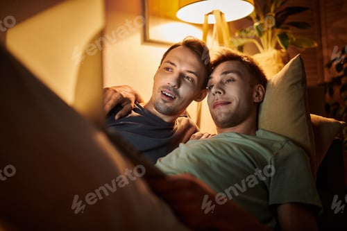 Preview: Loving couple enjoying a cozy evening together at home