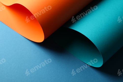 Preview: Color sheets on blue background, close up. Abstract background