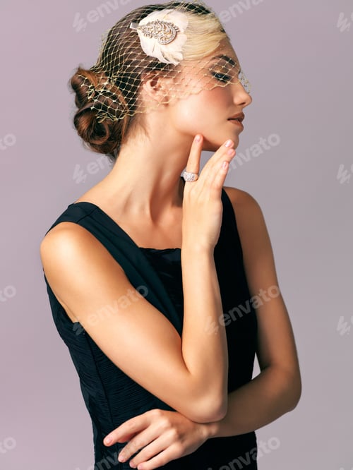 Woman in Black Dress with Birdcage Veil