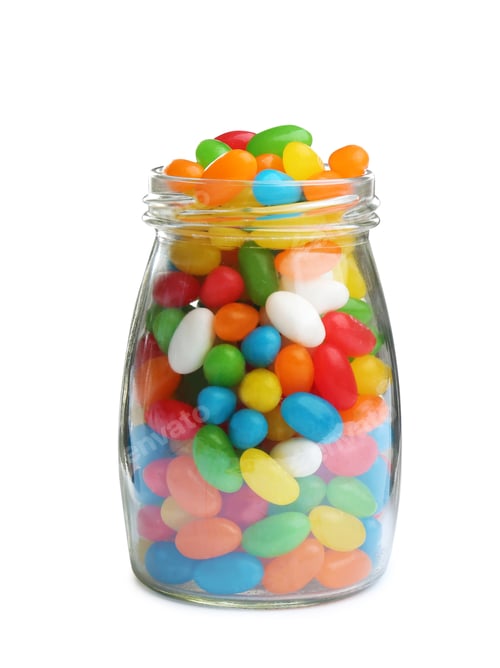 Preview: Glass jar of tasty jelly beans on white background