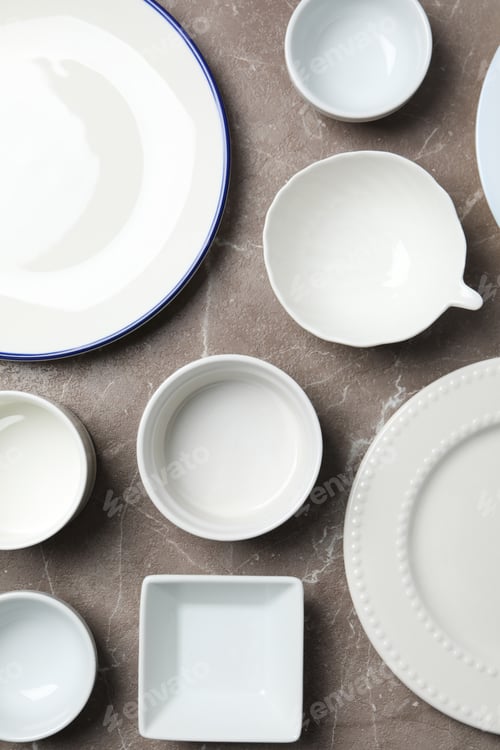 Preview: Minimal table setting with blank dish, top view