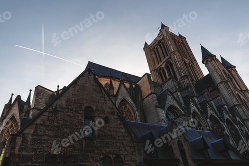 Preview: low angle view of beautiful ancient architecture in historical quarter of Ghent, Belgium
