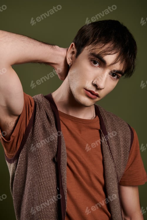 Preview: Elegant Man Posing Against Vibrant Green Background