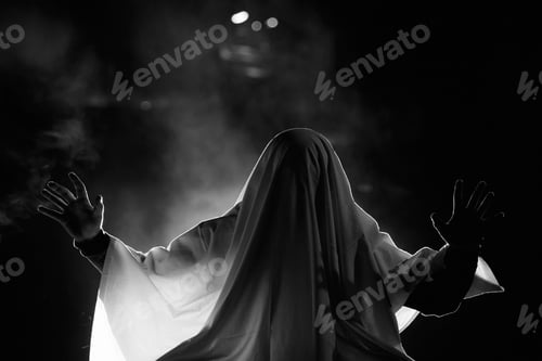 Preview: Halloween concept with ghost on a foggy night.
