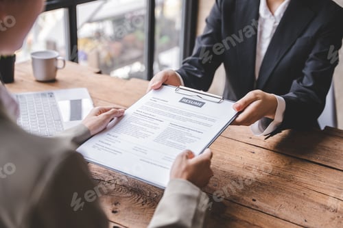 Preview: Portrait of a person interviewing for a job and
Submit resume to staff job application concept