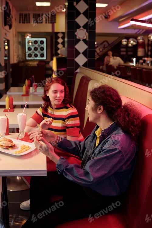 Preview: Enjoying Delicious Meal in Retro Diner Setting