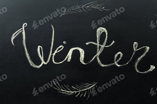 Preview: Chalk inscription winter on black Board holidays