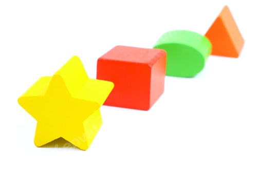 Preview: Colorful wooden geometric blocks isolated on white background