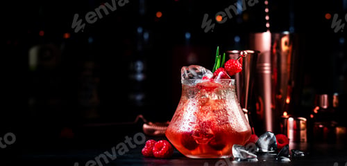 Preview: Summer raspberry alcoholic cocktail with rum, soda, rosemary and crushed ice, black background