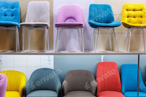 Preview: Display of chairs in retail space of furniture store.
