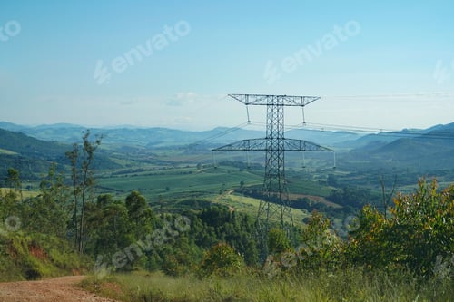 Preview: Rural landscape with tower of energy cables