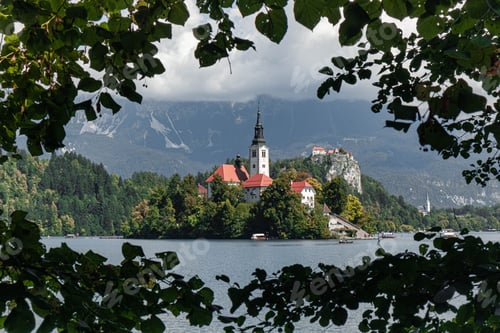 Preview: View of the historic Bled castle taken from trees across the Bled lake in Slovenia