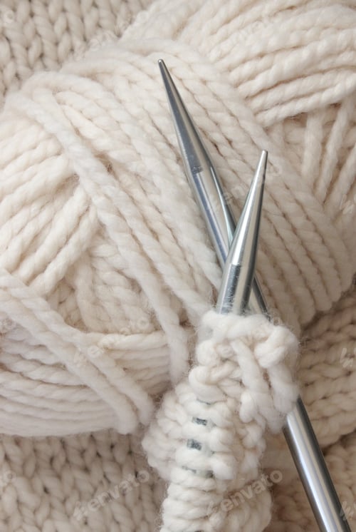 Preview: Full frame ivory yarn with knitting needles