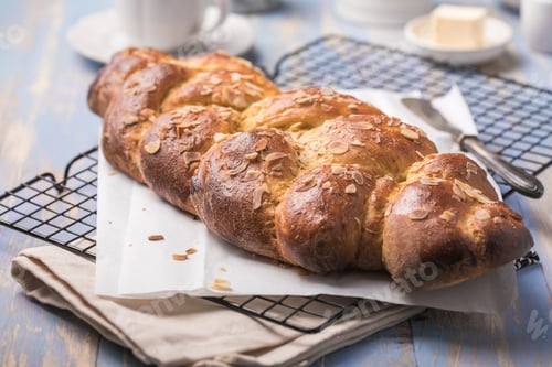 Preview: Tsoureki braid, greek easter sweet bread, on wood