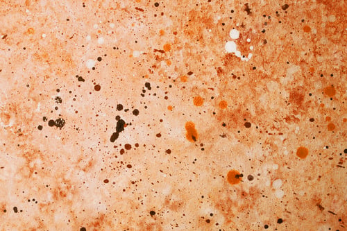 Preview: Colorful paint splatters on textured surface create abstract art background