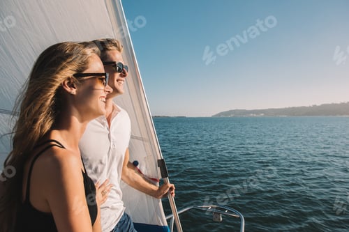 Preview: Couple enjoying view on sailboat, San Diego Bay, California, USA