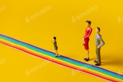 Preview: little parents and son figures on the LGBT rainbow path