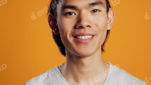 Preview: Male model smiling and being carefree on camera