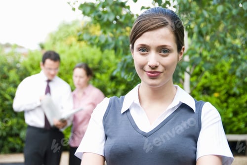 Preview: Portrait of women with co workers