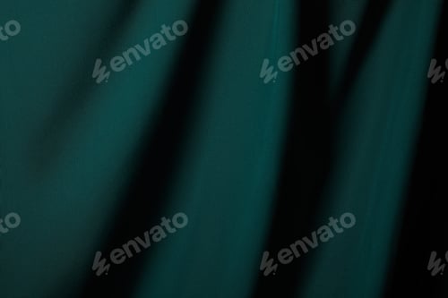 Preview: close up view of emerald soft and wavy silk fabric