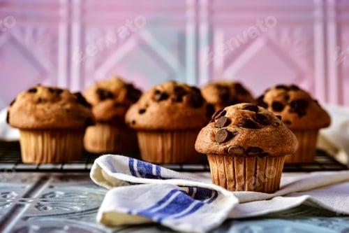 Preview: Chocolate Chip Muffins Displayed on a Rack