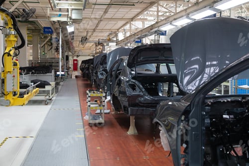 Preview: Add details to car body. Robotic equipment makes Assembly of car. Modern car Assembly at factory