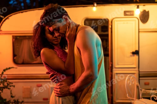 Preview: Young couple on vacation with the camper