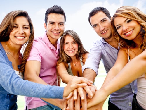 Preview: Group Of Young People With Hands Together - Teamwork Concepts