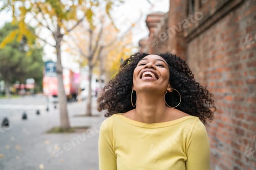 Preview: Portrait of Afro-american woman laughing.