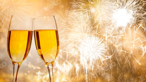 Preview: Glasses of champagne on holiday background