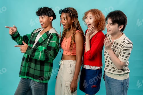 Preview: Group of diverse Generation Z friends posing on isolated blue screen.