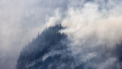 Preview: BC Forest Fire and Smoke over the mountain near Hope during a hot sunny summer day
